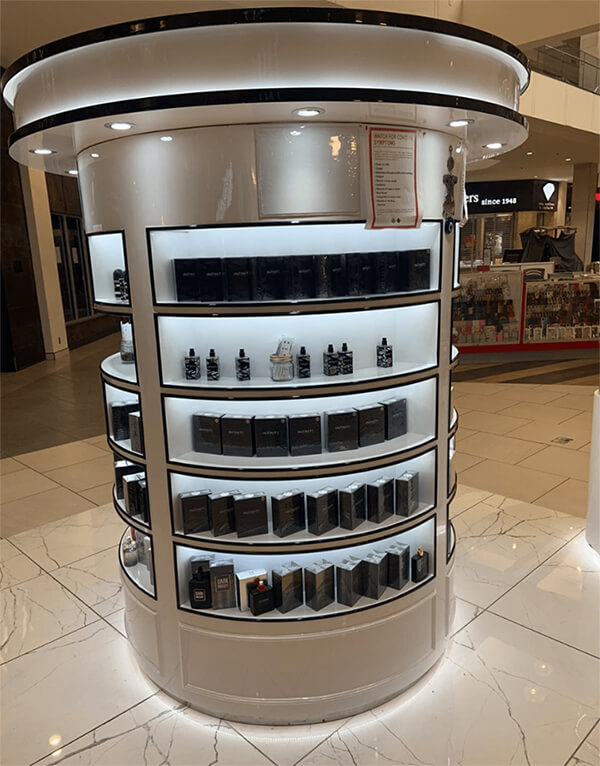رف عرض العطور العمودي